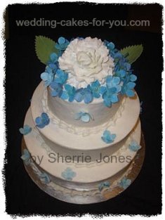 Pretty Blue and White Wedding Cake by Sherrie Jones