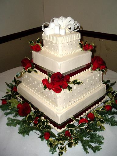 Another square shaped Christmas wedding cake this one with loads of fresh