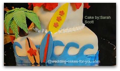 Close up of the surf boards waves and a palm tree