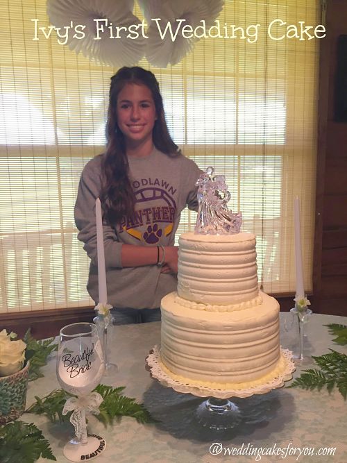 Ivy and her first wedding cake