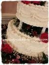 A Wedding Cake Frosted and Decorated with Italian Meringue Buttercream