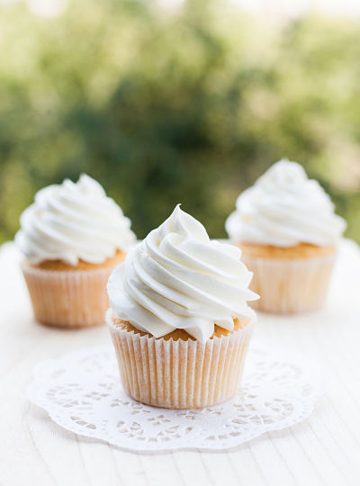 cupcakes with whipped cream icing