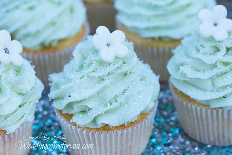 Vanilla cupcakes with soft teal buttercream